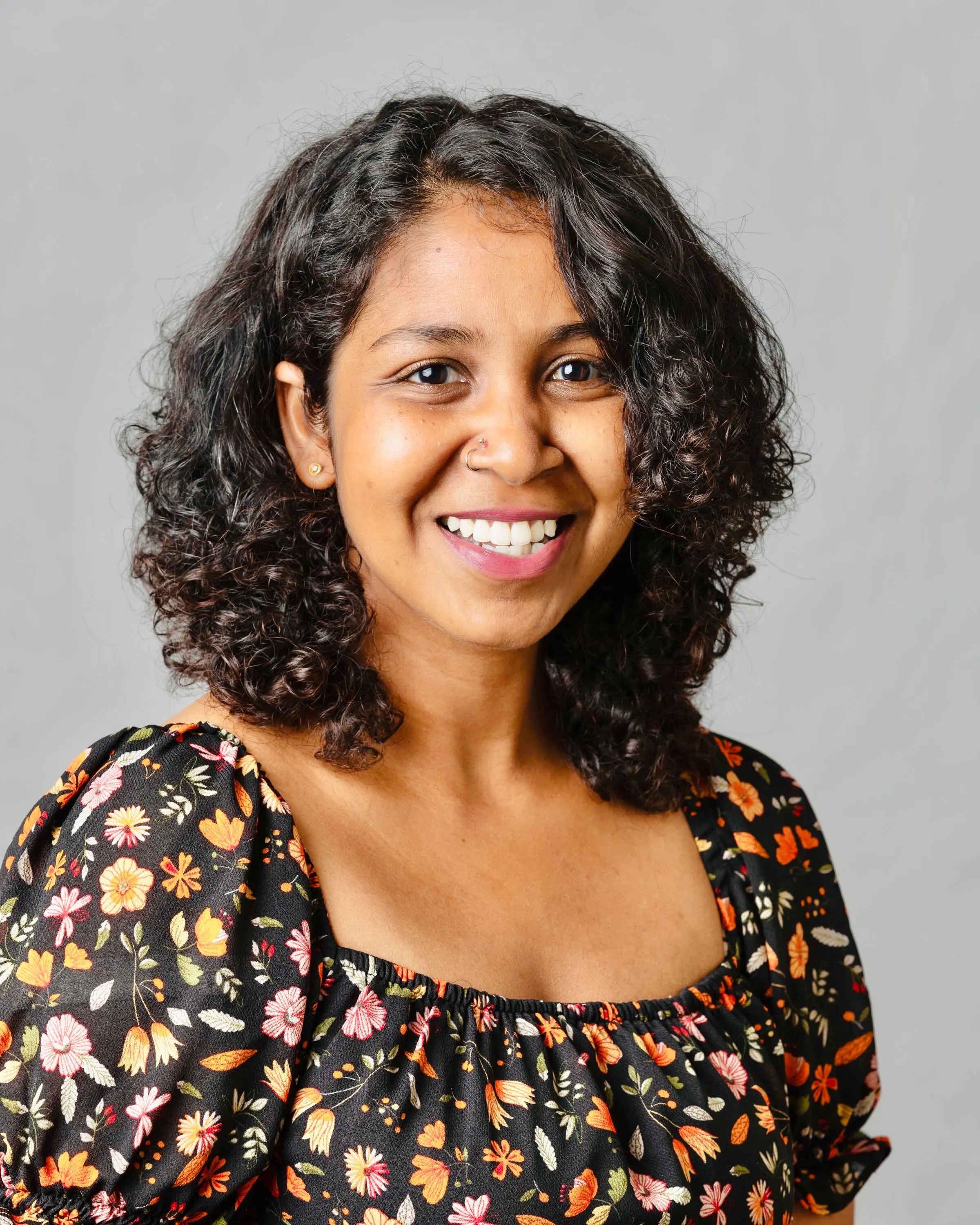 Woman in floral shirt
