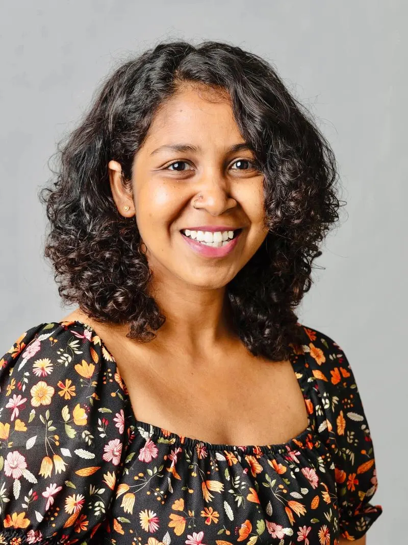 Woman in floral shirt