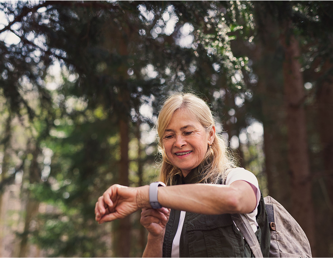 A women looking at a smart watch
